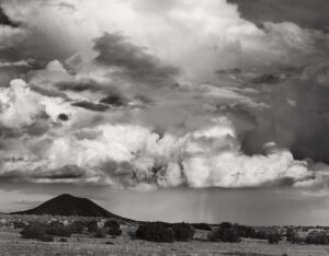 A black and white photo of clouds in the sky.