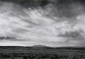 A black and white photo of the sky