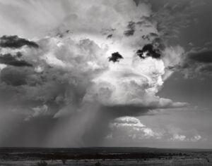 A black and white photo of clouds in the sky.