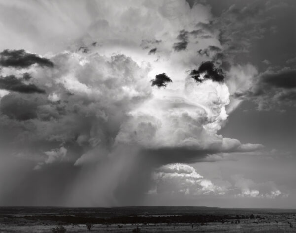 A black and white photo of clouds in the sky.