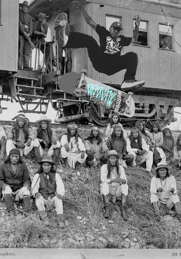 A group of people sitting on top of a hill.