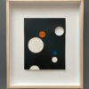 A painting of planets in the sky with blue and orange circles.
