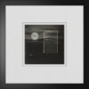 A black and white photo of the moon with a square frame.