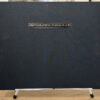 A black book cover with the title " photographing in high places ".