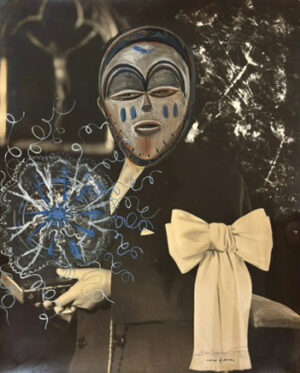 A person wearing a mask and holding something