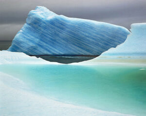 A large piece of ice floating in the air.