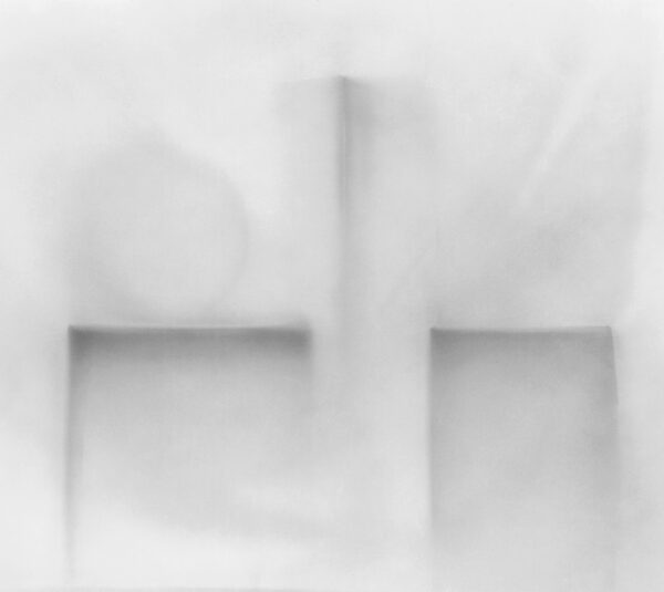 A blurry image of the top of a window.