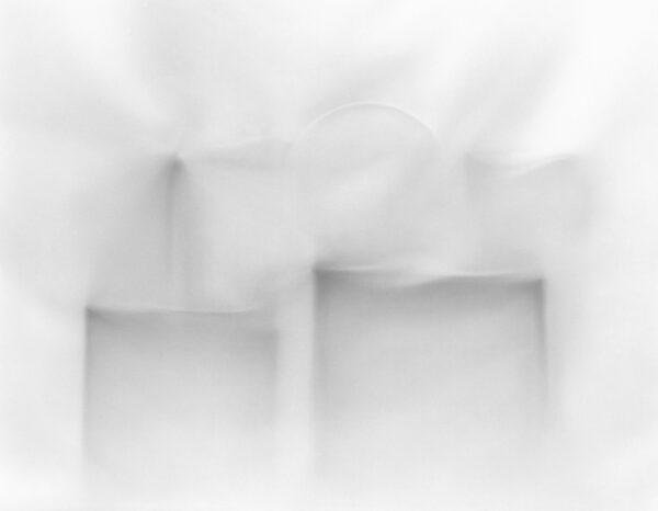 A blurry image of two windows in the window.