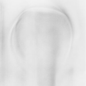 A blurry image of a person 's head in the middle of a circle.