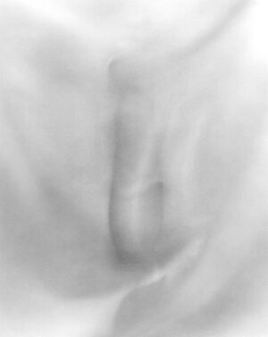A blurry image of the back end of a person 's shirt.