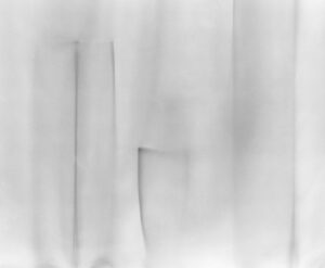 A blurry image of the outside of a building.