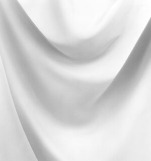 A white cloth is draped over the top of it.