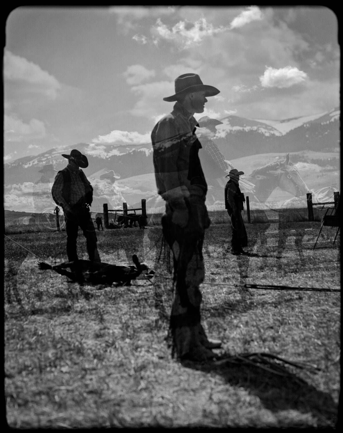 A black and white photo of men in hats