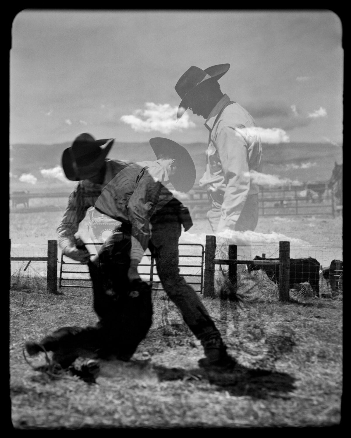 A man in cowboy hat and boots is holding on to another man.