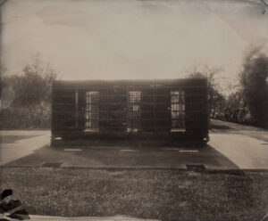 A black and white photo of an old building.
