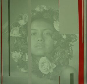 A woman with flowers in her hair is behind a screen.