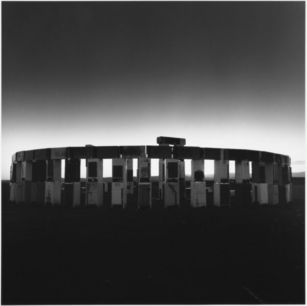 A black and white photo of stonehenge.