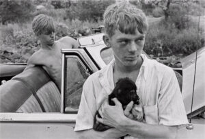 DANNY LYON. Boy With Puppy, Knoxville, Tennessee, 1967