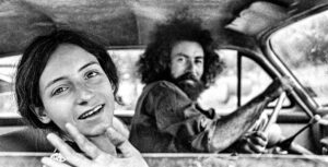 LYNN ADLER. Gloria and Marty wave