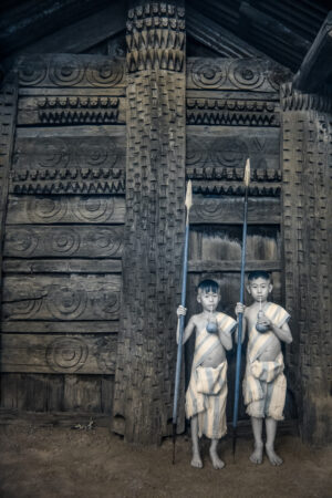 NEVADA WIER. India. Manipur. Sithai Village. Tangkhul Naga Tribe.Y oung Boys in front of Murong. 2012